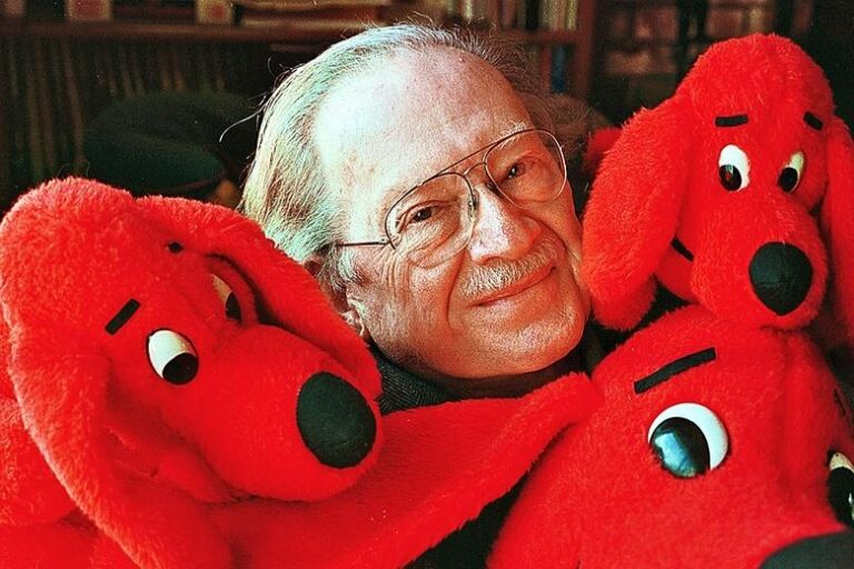 Author Norman Bridwell with his children's book character Clifford the Big Red Dog.