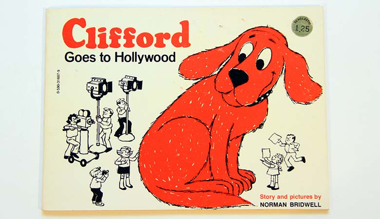 Cover art of 'Clifford Goes to Hollywood' book by author Norman Bridwell, featuring Clifford the Big Red Dog amidst Hollywood symbols.